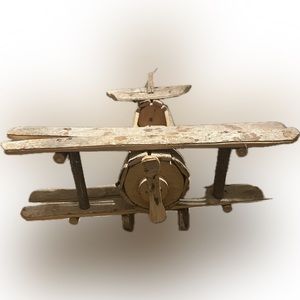 Vintage artibetter plane made of tree limbs